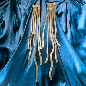 gold ribbon statement earrings